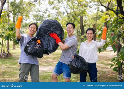 Group Of Asian People With Garbage Bags Stock Photo Image Of Male