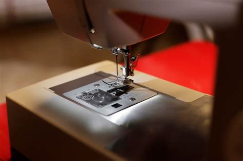 Premium Photo | Detail of electric sewing machine sewing