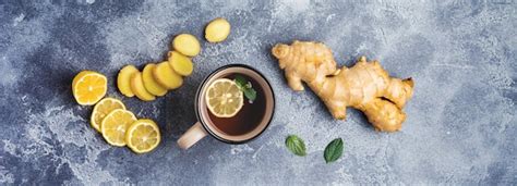 Premium Photo Cup Of Hot Ginger Tea With Lemon And Honey On Dark Gray Background Top View