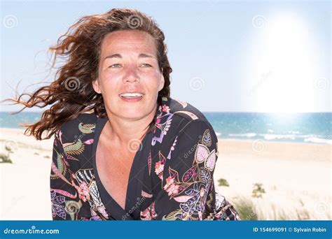 Attractive Middle Aged Brunette Woman At The Seaside Summer Stock Image Image Of Freedom