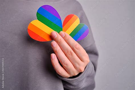 Rainbow Heart From Paper In Woman Hands LGBT Flag LGBTQIA Pride Month In June Lesbian Gay