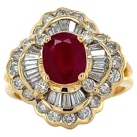 18k Yellow Gold Oval Red Ruby W A Halo Of Baguette And Round Diamonds