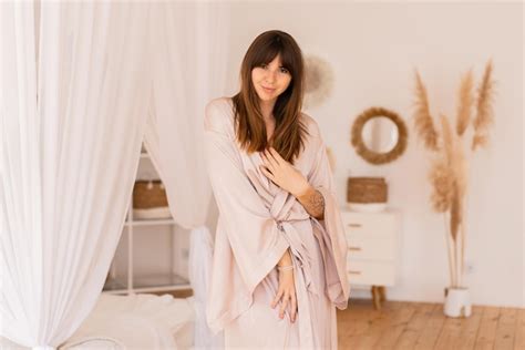 Free Photo Sensual Brunette Woman Posing In Beige Silk Kimono In