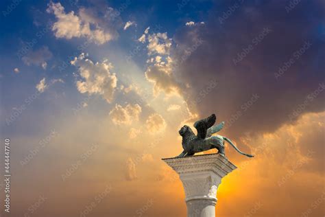 Bronze lion on the Piazza San Marco on blue sky background, Venice ...