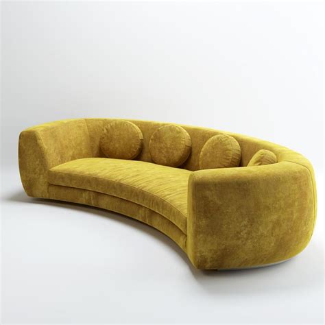 A Yellow Curved Couch Sitting On Top Of A White Floor