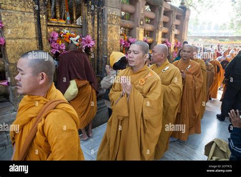 Buddhist Monks Praying At The Mahabodhi Temple In Bodhgaya India Stock