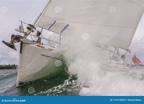 Sailing Boat Yacht In Rough Sea Waves Stock Photo Image Of Ensign