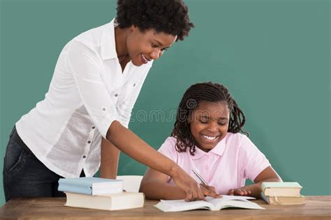 1394 Happy Teacher Teaching Her Student Stock Photos Free And Royalty