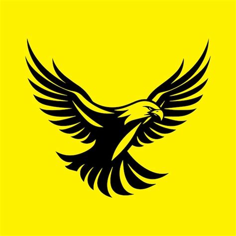 Premium Vector | A eagle flying vector logo on a yellow backround