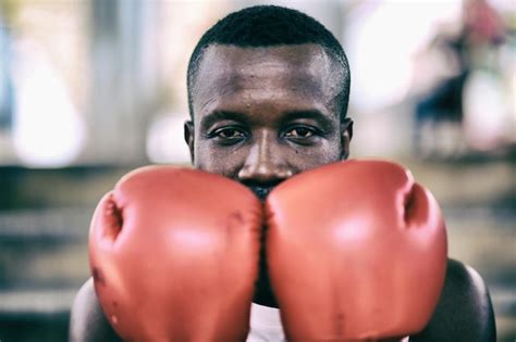 Premium Photo Portrait Of Man Wearing Boxing Glove