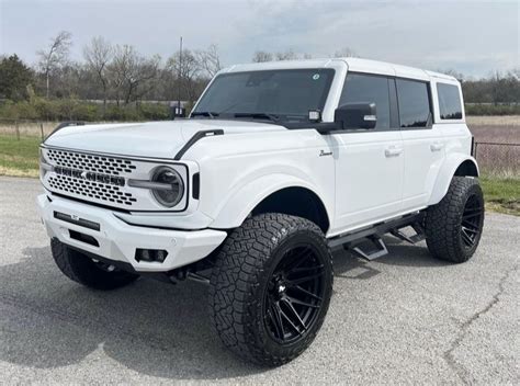 White Ford Bronco Parked on the Street