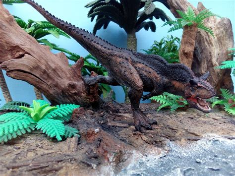 A Papo Model Of A Carnotaurus Modified Repainted And Photographed In A