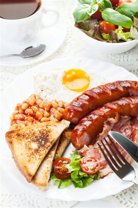 Full English Breakfast With Bacon Sausage Fried Egg And Baked Beans