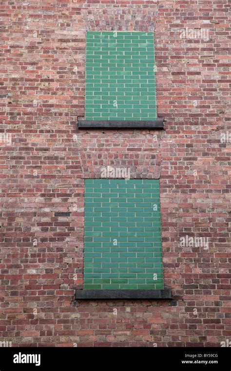 A Brick Wall With Blocked Windows Stock Photo Alamy