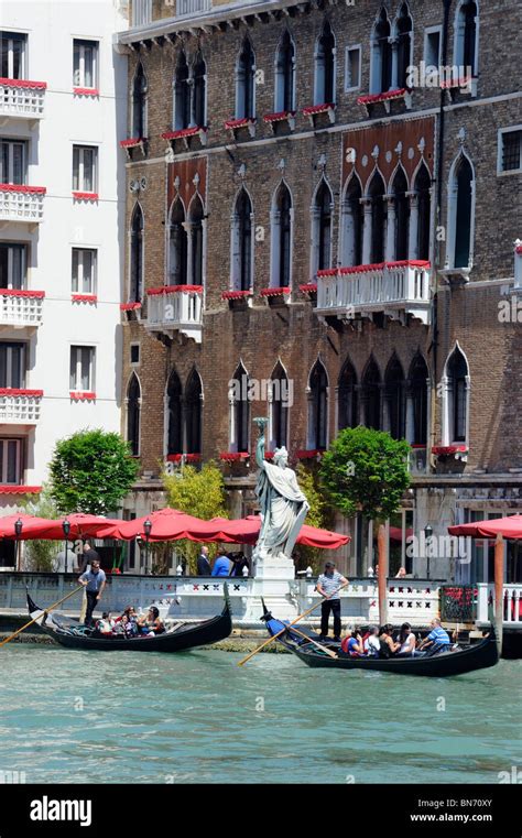 Gondolas On The Grand Canal Besiide Palazzo Cavalli Franchetti In Stock