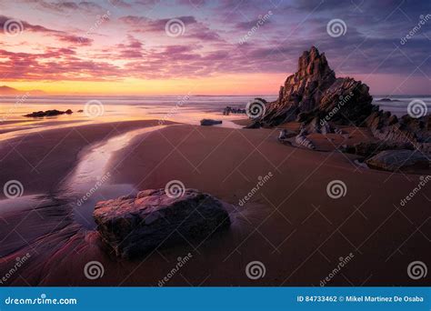 Rock In Sopelana Beach At Sunset Stock Photo Image Of Vizcaya