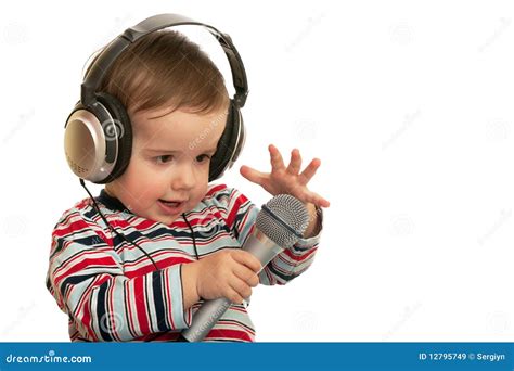 Speaking Toddler With Headphones And Microphone Stock Image - Image of clever, head: 12795749