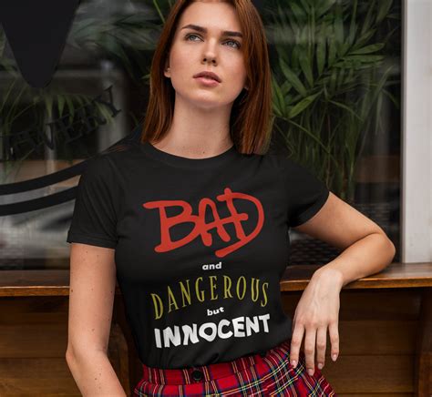 CAMISETA UNISEX BAD AND DANGEROUS BUT INNOCENT GEN 7 STYLE Applehead