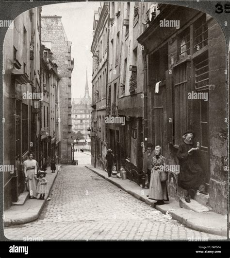 Narrow Street In Old Latin Quarter Notre Dame In Distance Paris France