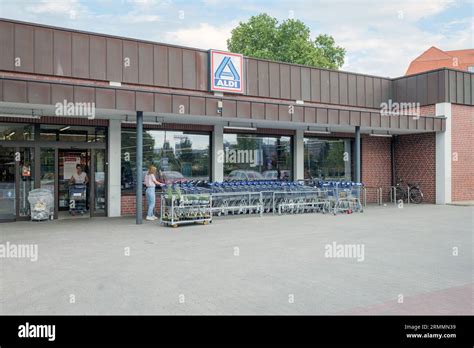 Aldi Store In Berlin Germany Two Customers In Front Of The Store Stock