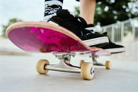 Close Up Of Skateboarder X27 S Feet On Skateboard Stock Photo Image