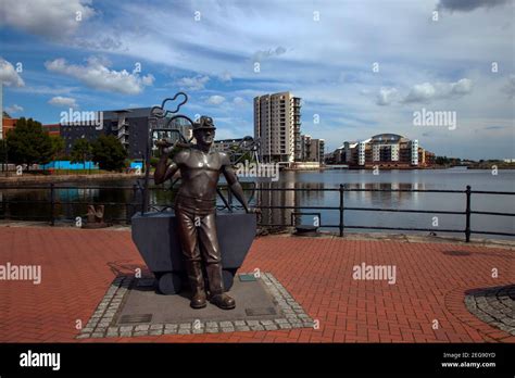 Bronze Statue Of Coalminer From Pit To Port Roath Basin Cardiff Bay