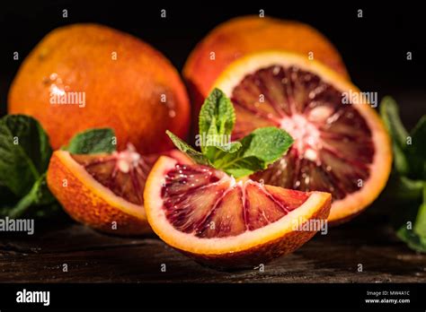 Whole And Cut Ripe Juicy Sicilian Blood Oranges Stock Photo Alamy