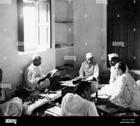 Mahatma Gandhi in meeting with Jawaharlal Nehru ; Rajendra Prasad ; Pyarelal Nayar and others at ...