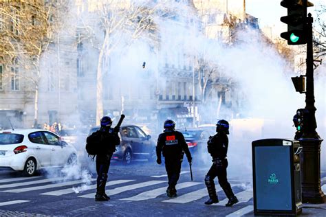 Paris Police Fire Tear Gas To Disperse Banned Virus Protest