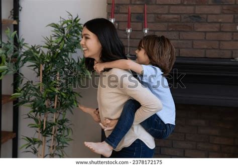 Side View Smiling Asian Mother Piggy Stock Photo 2378172175 Shutterstock