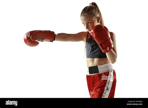 Young Female Kickboxing Fighter Training Isolated On White Background