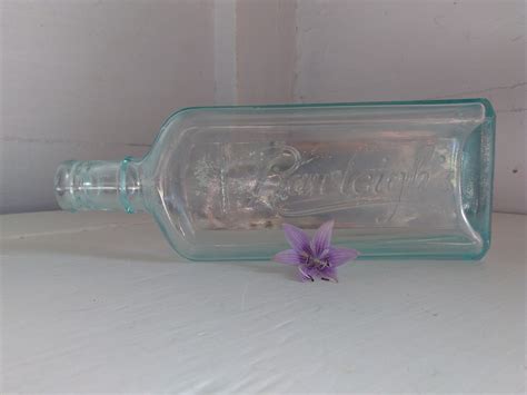 Large Old Rawleighs Medicine Bottle Apothecary Jar Vase Aqua Blue