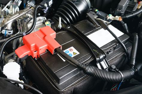 How To Tell Positive And Negative Terminals On A Car Battery In The Garage With