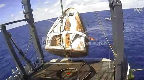 Spacex Crew Capsule Ends Test Flight With Ocean Splashdown