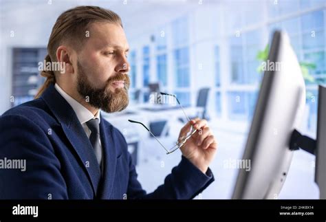 Man using pc at office Stock Photo - Alamy