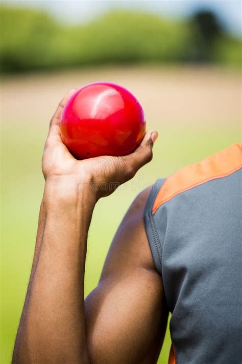 Male Athlete Holding Shot Put Ball Stock Photo Image Of Hand