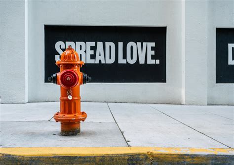 Red Fire Hydrant On Street Side · Free Stock Photo