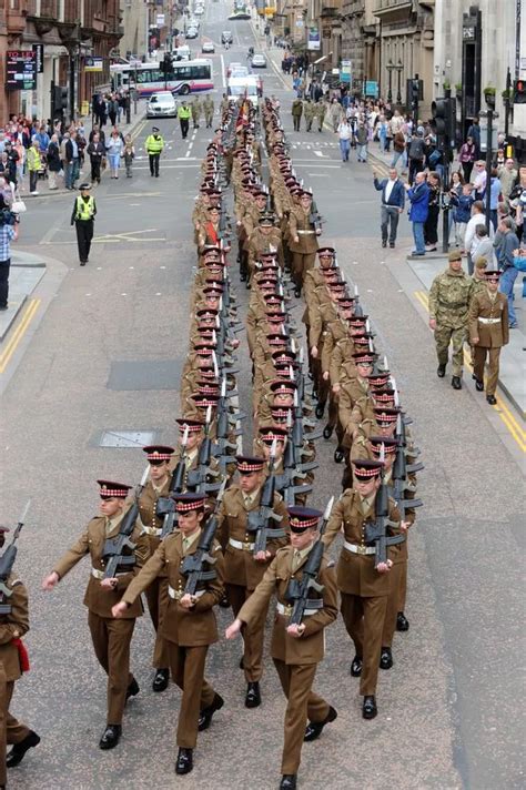 Heroes Welcome For Scots Guards As They March Through Glasgow To Mark