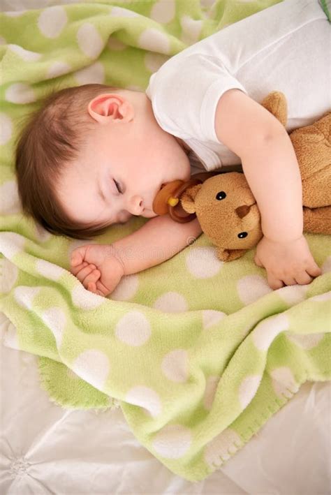 He Always Naps After Feeding An Adorable Baby Boy Taking A Nap Stock Photo Image Of Brunette