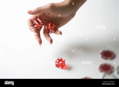 Hands Rolling Dice Stock Photo Alamy