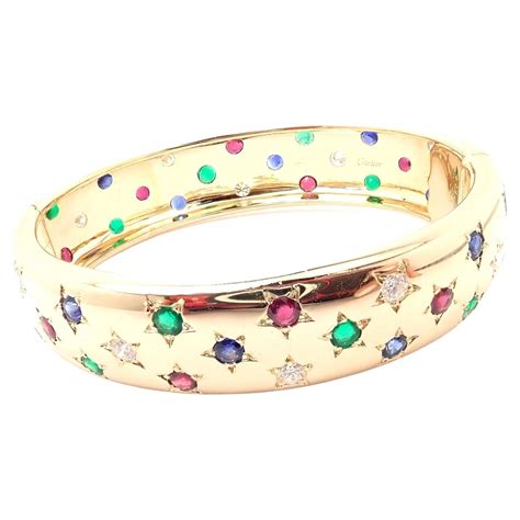 Cartier Sapphire Emerald Ruby Yellow Gold Bangle Bracelet At 1stdibs