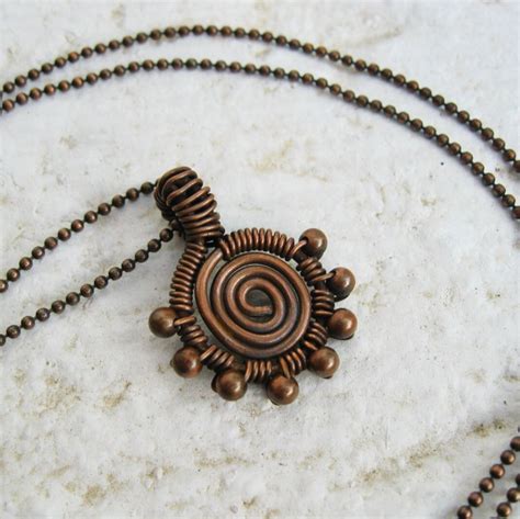 Antiqued Copper Wire Wrapped Swirl Pendant Necklace With