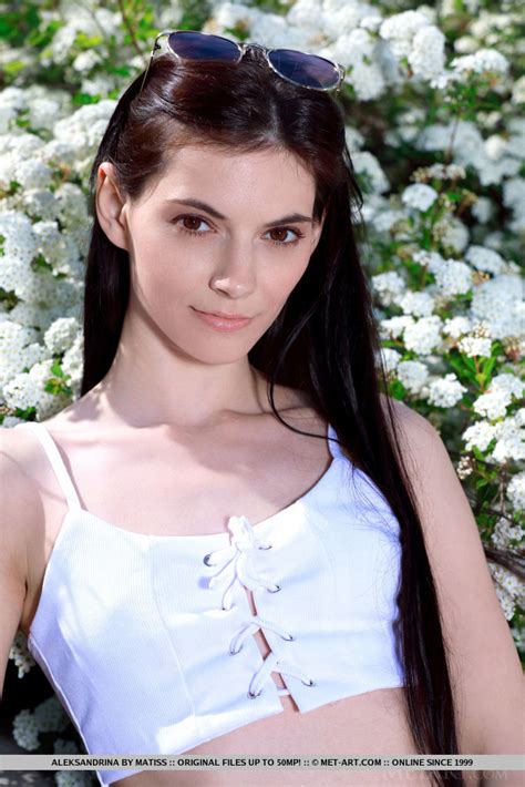Brunette Teen Aleksandrina Gets Totally Naked In Front Of Blooming