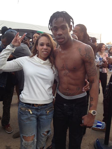 Travis Scott and Zarina Lawson... He's fresh off the stage and I'm ...