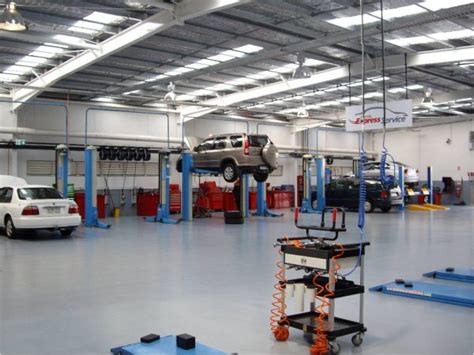 Automobile Repair Shop with Cars on Lifts