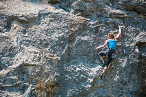 The Climber is Training To Climb the Rock. Stock Image - Image of ...