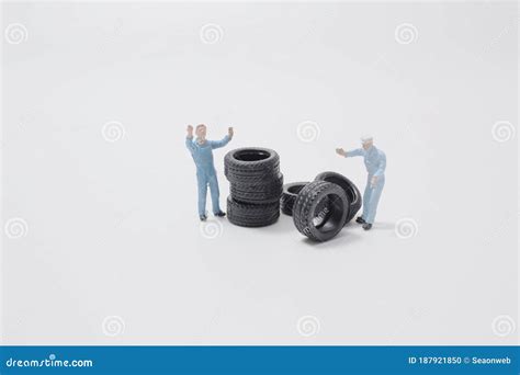 Mini Figure Mechanic Repairing Dusty Car Wheel Stock Photo Image Of