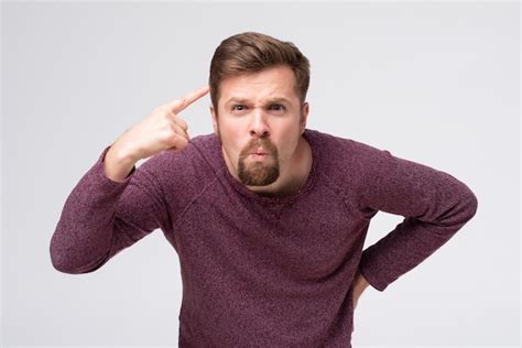 Premium Photo Quarrel With Coworker Angry Mature Man Twisting Index
