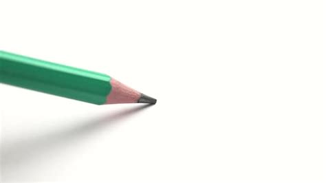 Pencil lead breakage due to stress and anger on white paper, Stock Footage