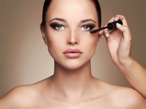 Makeup Artist Applies Mascara Beautiful Woman Face Beauty Girl With